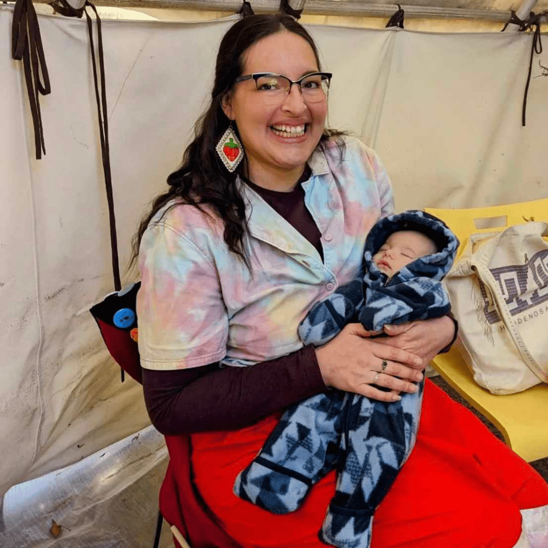 Mshikkik Gitigaan Kwe holding her baby boy