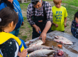 cutting fish in front of students in saskatchewan
