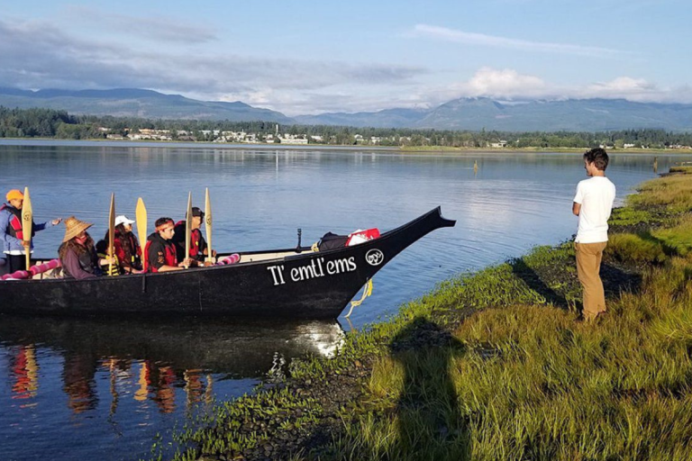 awaken the canoes a large canoe labelled Tlemtlems on a tribal journey in British Columbia