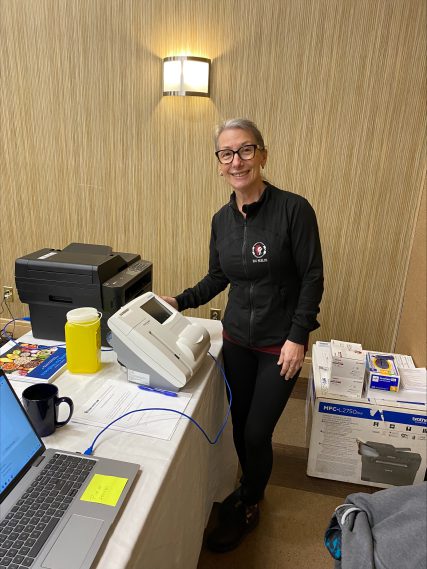 Nurse standing and smiling